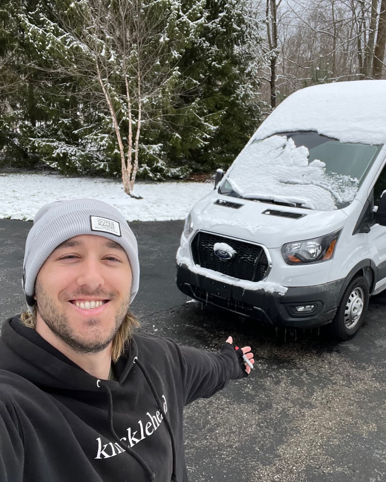 Dave, CarCurve founder, standing in front of a van